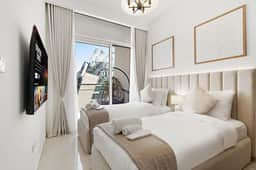 Cozy 2BR w/ Partial Canal View | Business Bay - Image 3