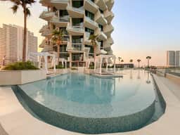 Luxe 1BR in JVC with Private Jacuzzi & Pool Access - Image 5