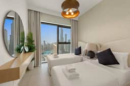 Luxe 4BR w/ Balcony & Panoramic Burj Khalifa Views - Image 3