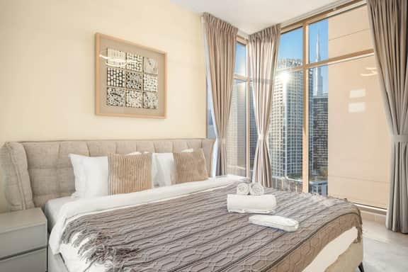 Cozy 2BR w/ Canal View & Partial Burj View | 10mn to Downtown - Image 2