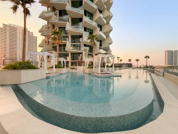 Luxe 1BR in JVC with Private Jacuzzi & Pool Access - Image 5
