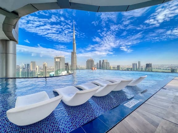 3BR w/ Panoramic Infinity Pool & Burj Khalifa View - Image 1