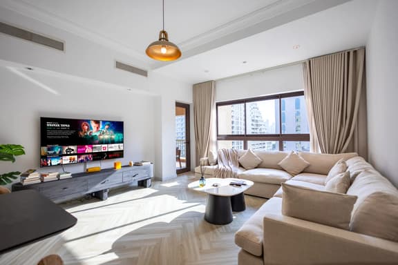 Spacious 1BR w/ Terrace | Near Palm Jumeirah Mall - Image 1